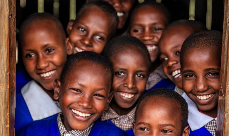 Access to Education – students engaged with books and support materials