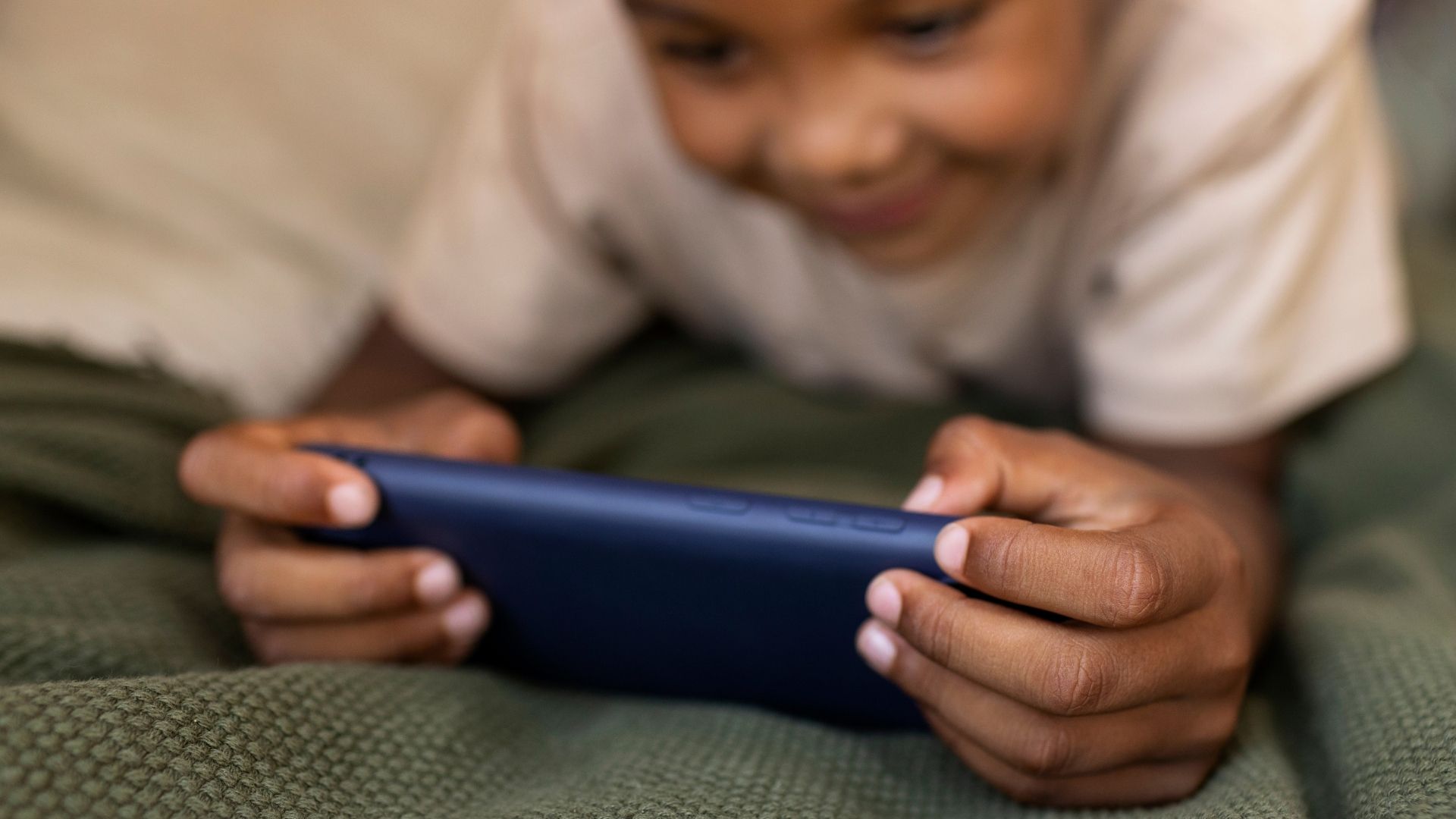 Parent guiding a child in safe phone use