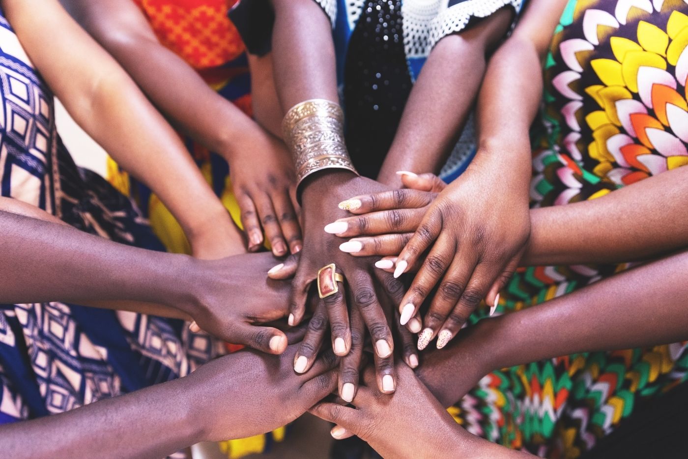 Caregivers meeting in a support group to strengthen household resilience